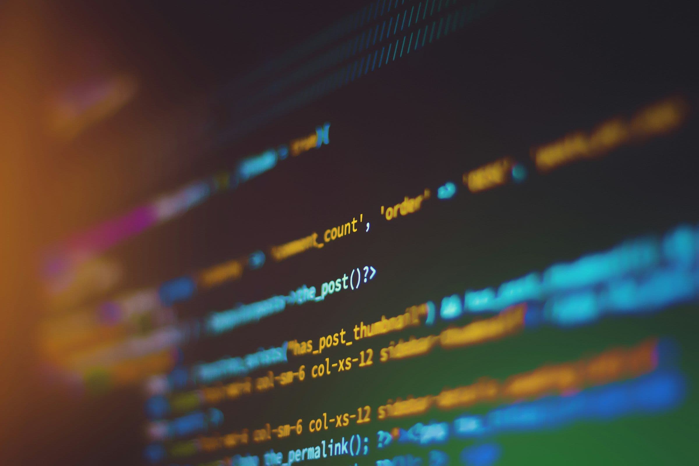 Close-up of WordPress PHP template code on a screen, the kind of code plugins and themes add to a site